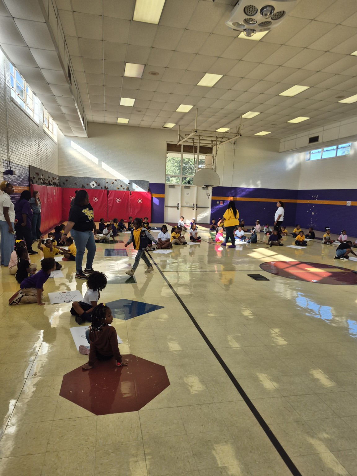 Students and Community Wellness & Resource Hub volunteers during the Clara Hall Elementary CPR program